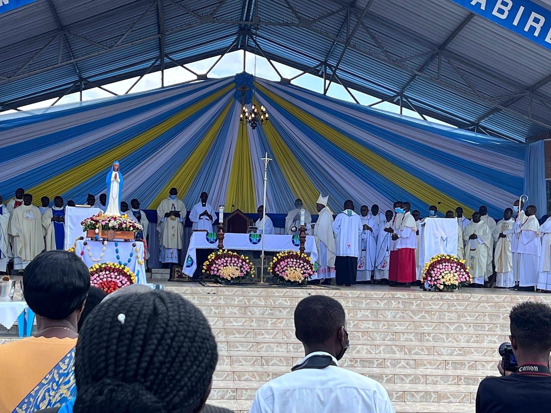 The statue of Our Lady beside the altar during Mass at Kibeho