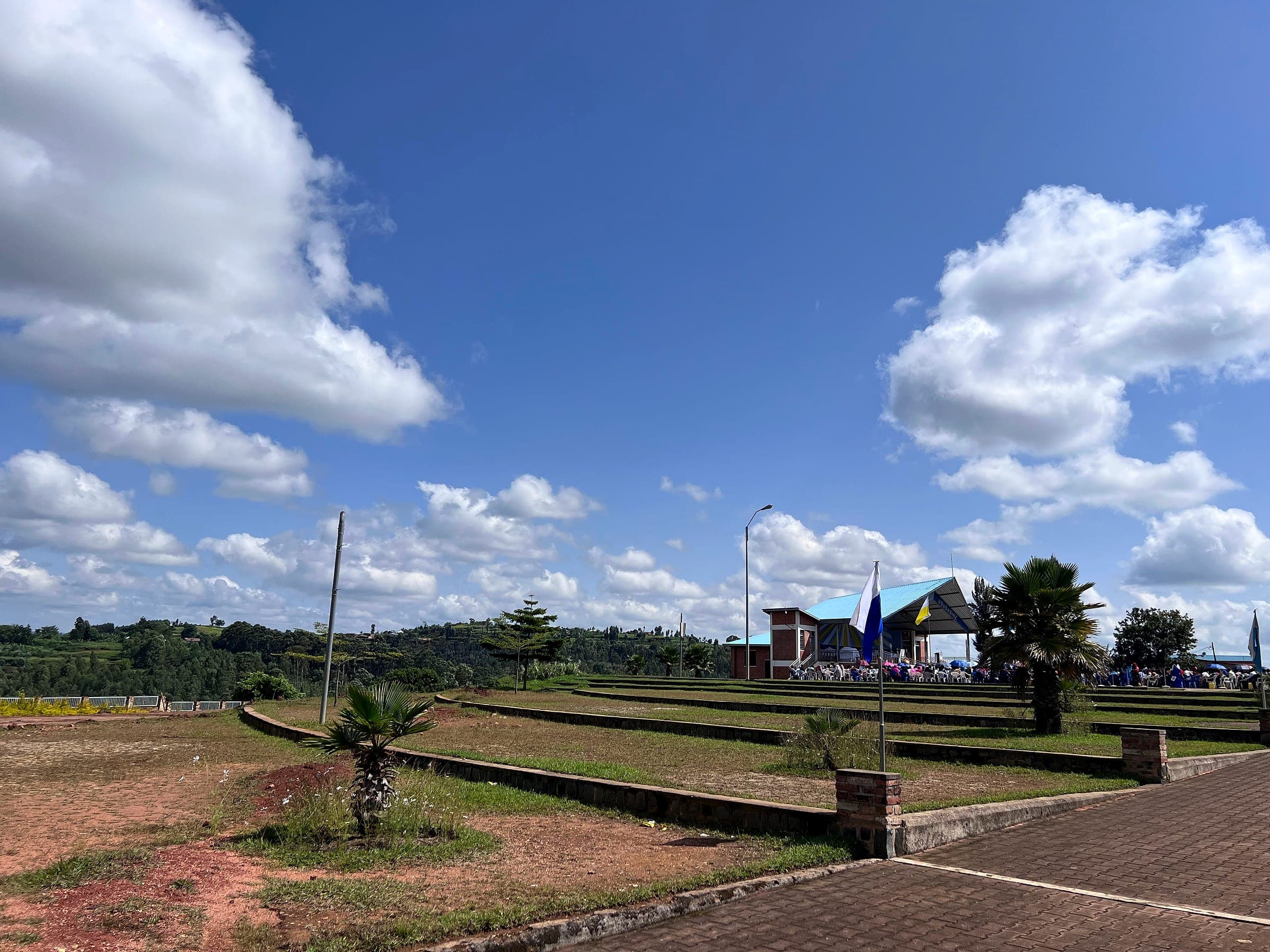 The grounds of the Kibeho shrine under a wide blue sky